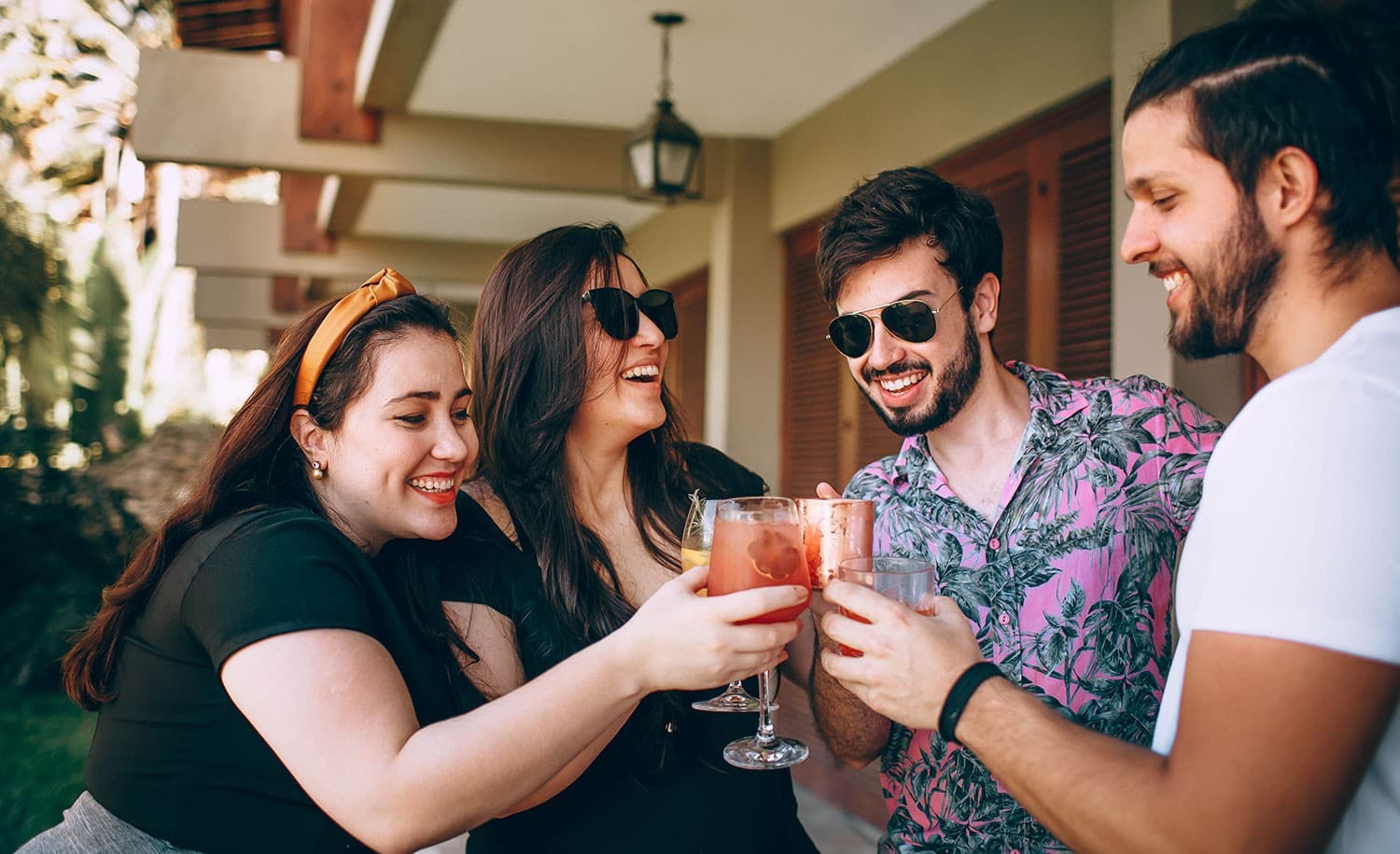 Four friends drinking together