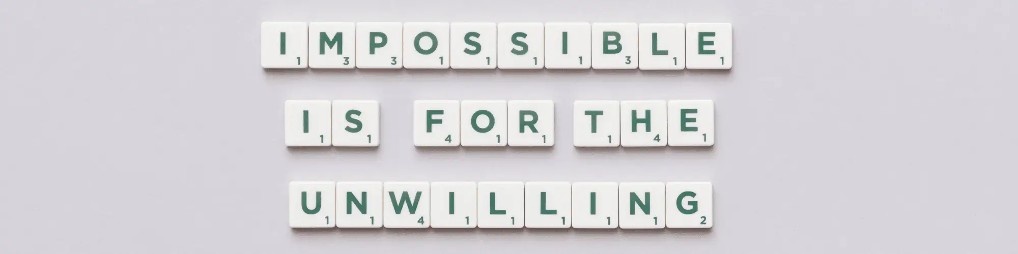 Why Nearby AA Groups Chicago Are Vital for Alcohol Recovery scrabble tiles that state "impossible is for the unwilling"